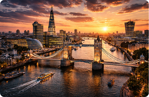 London skyline at sunset featuring Tower Bridge and The Shard